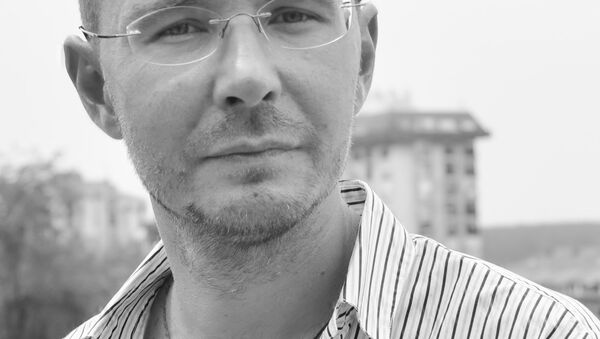 Ruski pesnik, prevodilac i kulturolog Oleg Komkov - Sputnik Srbija