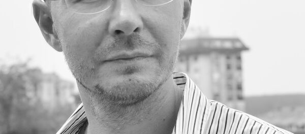 Руски песник, преводилац и културолог Олег Комков - Sputnik Србија