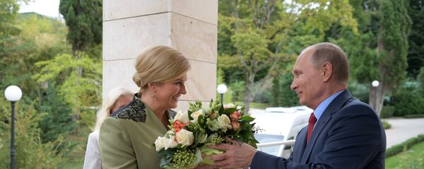 Predsednik Rusije Vladimir Putin i predsednica Hrvatske Kolinda Grabar Kitarović Predsednik Rusije Vladimir Putin i predsednica Hrvatske Kolinda Grabar Kitarović - Sputnik Srbija