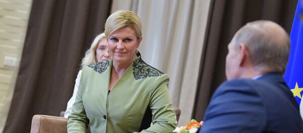 Председник Русије Владимир Путин и председница Хрватске Колинда Грабар Китаровић Председник Русије Владимир Путин и председница Хрватске Колинда Грабар Китаровић - Sputnik Србија