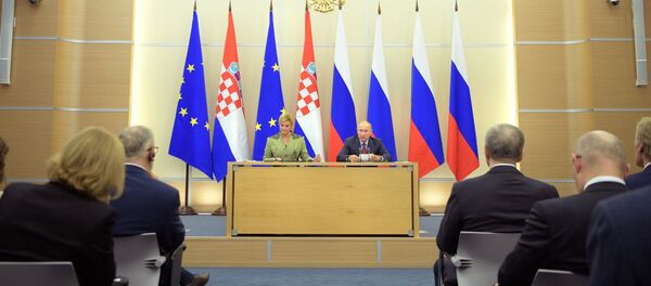 Vladimir Putin i Kolinda Grabar Kitarović Vladimir Putin i Kolinda Grabar Kitarović - Sputnik Srbija