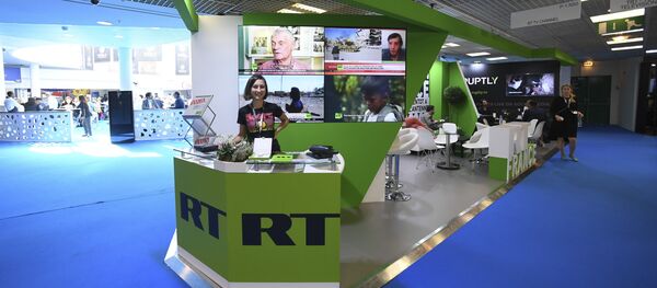 Штанд телевизије РТ на Међународном сајму аудио-визуелног садржаја у Кану - Sputnik Србија