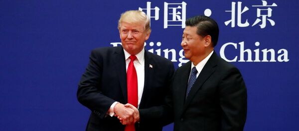 Predsednici SAD i Kine Donald Tramp i Si Đinping na sastanku u Kini Predsednici SAD i Kine Donald Tramp i Si Đinping na sastanku u Kini - Sputnik Srbija