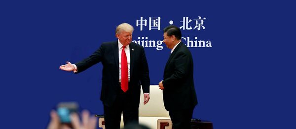 Predsednici SAD i Kine Donald Tramp i Si Đinping na sastanku u Kini Predsednici SAD i Kine Donald Tramp i Si Đinping na sastanku u Kini - Sputnik Srbija