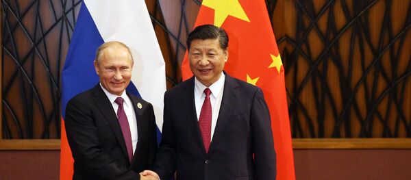 Predsednik Rusije Vladimir Putin i predsednik Kine Si Đinping na samitu ATEK - Sputnik Srbija