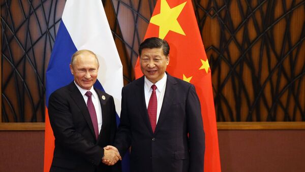 Председник Русије Владимир Путин и председник Кине Си Ђинпинг на самиту АТЕК - Sputnik Србија