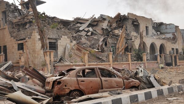 Стамбени објекти у Дејр ел Зору уништени током војне операције сиријских владиних снага против терористичке групе ДАЕШ - Sputnik Србија