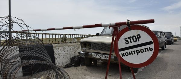 Гранични прелаз Џанкој на руско-украјинској граници Гранични прелаз Џанкој на руско-украјинској граници - Sputnik Србија