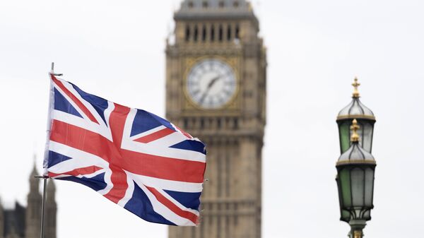 Британска застава испред Вестминстерске палате у Лондону - Sputnik Србија