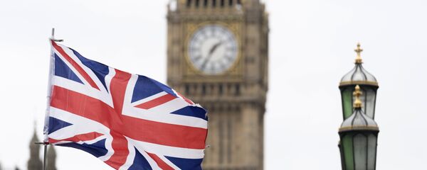 Britanska zastava ispred Vestminsterske palate u Londonu - Sputnik Srbija