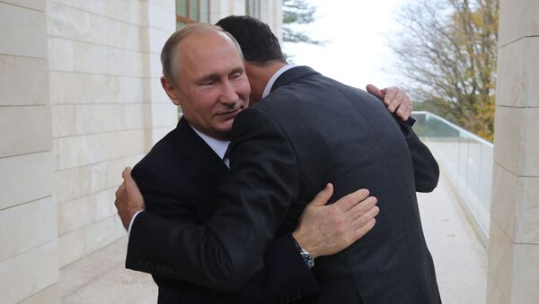 Председници Русије и Сирије Владимир Путин и Башар Асад у Сочију - Sputnik Србија