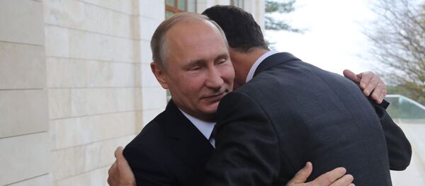 Председници Русије и Сирије Владимир Путин и Башар Асад у Сочију - Sputnik Србија