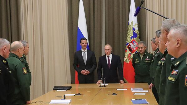 Predsednici Sirije i Rusije Bašar Asad i Vladimir Putin tokom sastanka u Sočiju - Sputnik Srbija