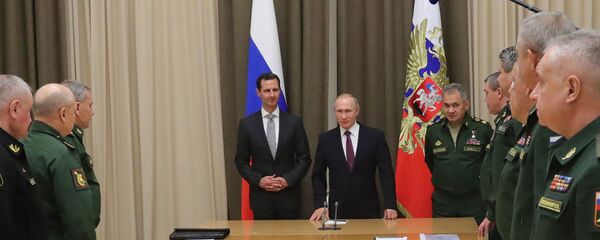 Predsednici Sirije i Rusije Bašar Asad i Vladimir Putin tokom sastanka u Sočiju - Sputnik Srbija