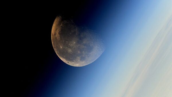 Mesec, snimak kosmonauta Sergeja Rjazanskog sa Međunarodne svemirske stanice - Sputnik Srbija