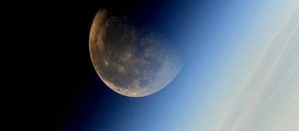 Месец, снимак космонаута Сергеја Рјазанског са Међународне свемирске станице - Sputnik Србија