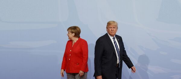 Angela Merkel i Donald Tramp Angela Merkel i Donald Tramp - Sputnik Srbija