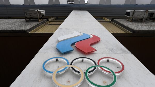 Олимпијски кругови на згради Олимпијског комитета Русије - Sputnik Србија