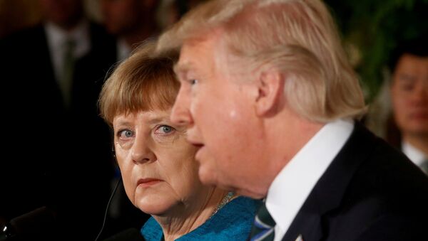 Nemačka kancelarka Angela Merkel i predsednik SAD Donald Tramp tokom zajedničke konferencije za medije u Beloj kući - Sputnik Srbija