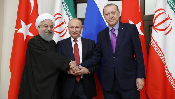 Председник  Ирана Хасан Рохани, председник Русије Владимир Путин и председник Турске Реџеп Тајип Ердоган - Sputnik Србија