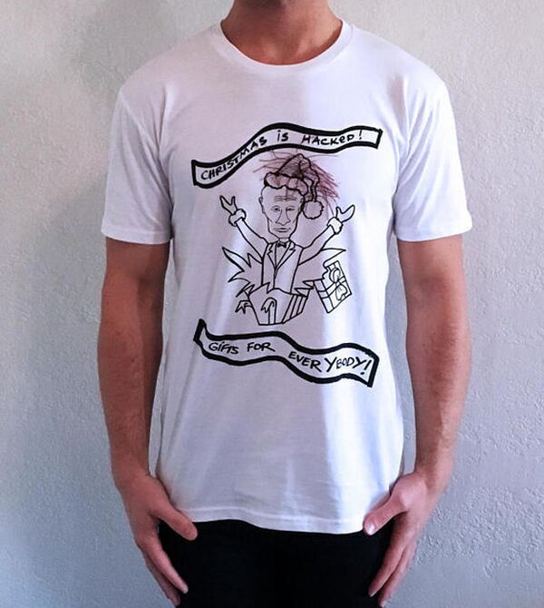 Мајица из божоћне колекције америчког дизајнера „Путин те воли” Мајица из божоћне колекције америчког дизајнера „Путин те воли” - Sputnik Србија