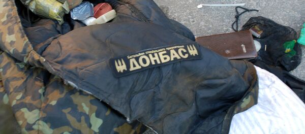 Ствари украјинских војника пронађених у Доњецку Ствари украјинских војника пронађених у Доњецку - Sputnik Србија