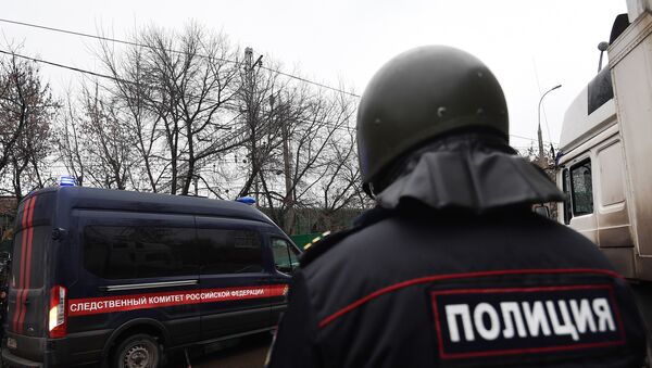 Припадник полиције и полицијско возило у Москви - Sputnik Србија
