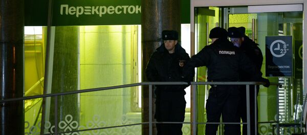 Policajci na mestu eksplozije u prodavnici u Sankt Peterburgu Policajci na mestu eksplozije u prodavnici u Sankt Peterburgu - Sputnik Srbija