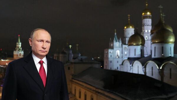 Predsednik Rusije Vladimir Putin tokom novogodišnje čestitke građanima  - Sputnik Srbija