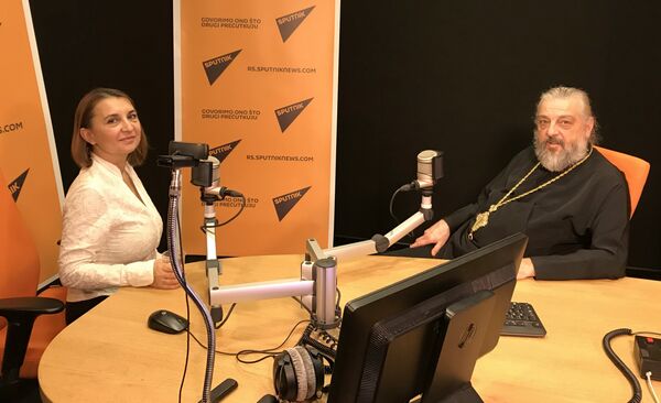Новинарка Спутњика Татјана Трикић и Виталиј Тарасјев. Новинарка Спутњика Татјана Трикић и Виталиј Тарасјев. - Sputnik Србија