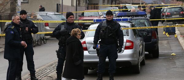 Косовска полиција на месту убиства Оливера Ивановића у Косовској Митровици. - Sputnik Србија