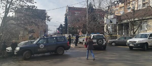 Косовска полиција на месту где је убијен Оливер Ивановић у Косовској Митровици. Косовска полиција на месту где је убијен Оливер Ивановић у Косовској Митровици. - Sputnik Србија