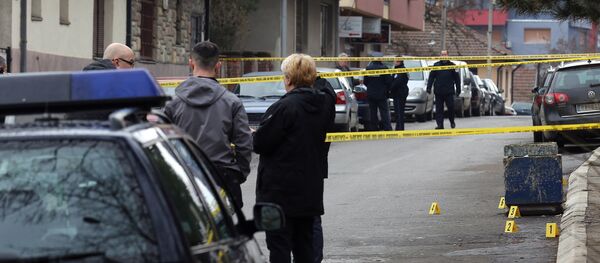 Увиђај на месту где је убијен Оливер Ивановић у Косовској Митровици. - Sputnik Србија