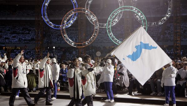 Zajednička zastava Severne i Južne Koreje na ceremoniji otvaranja Olimpijskih igara u Turinu 2006. - Sputnik Srbija
