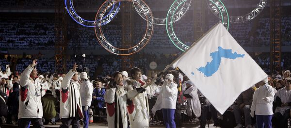 Заједничка застава Северне и Јужне Кореје на церемонији отварања Олимпијских игара у Турину 2006. - Sputnik Србија