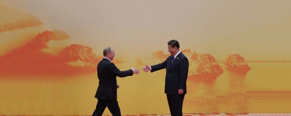 Владимир Путин и Си Ђинпинг на самиту Азијско-пацифичке економске сарадње - Sputnik Србија