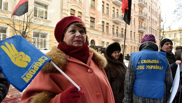 Aktivisti ukrajinskog pokreta Sloboda na mitingu u Kijevu - Sputnik Srbija