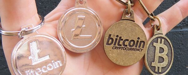 Криптовалуте биткоин и лајткоин Криптовалуте биткоин и лајткоин - Sputnik Србија