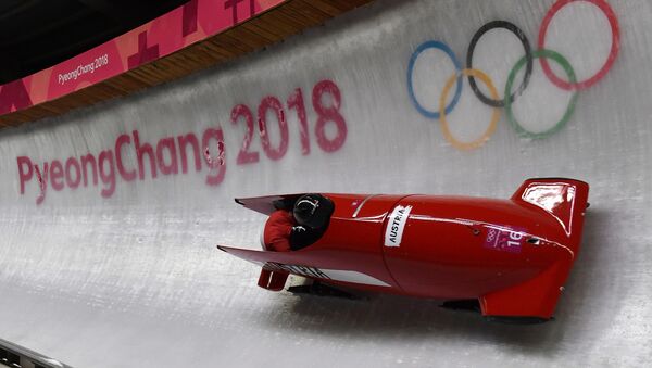 Švajcarske olimpijke Sabina Hafner i Rahel Rebsamen tokom takmičenja u bobu na Zimskim olimpijskim igrama 2018. u Pjongčangu - Sputnik Srbija