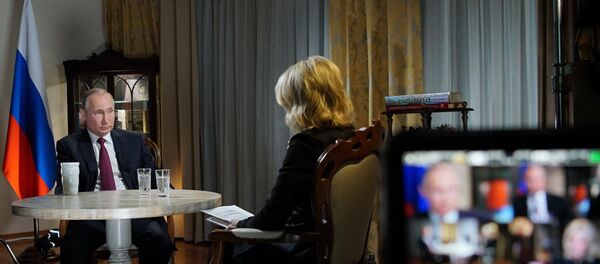 Predsednik Rusije Vladimir Putin tokom intervjua za televiziju En-Bi-Si - Sputnik Srbija