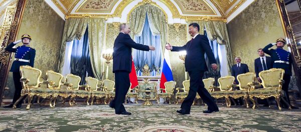 Predsednik Rusije Vladimir Putin i predsednik Kine Si Đinping - Sputnik Srbija