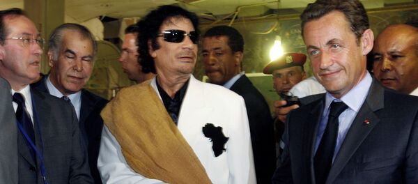 Никола Саркози и Муамер Гадафи - Sputnik Србија