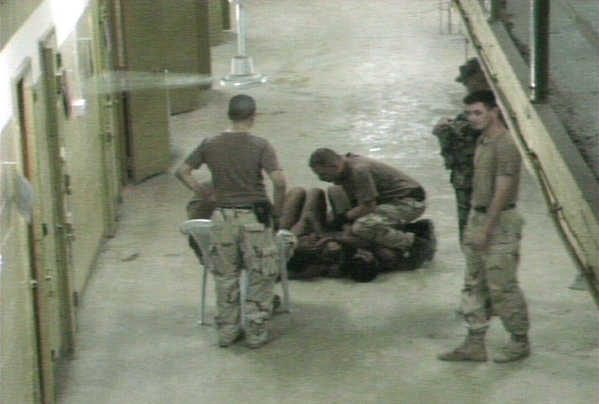 Амерички војници муче заробљенике у ирачком затвору Абу Грејб - Sputnik Србија, 1920, 18.03.2023