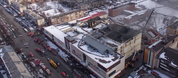 Zgrada tržnog centra Zimska višnja u Kemerovu Zgrada tržnog centra Zimska višnja u Kemerovu - Sputnik Srbija