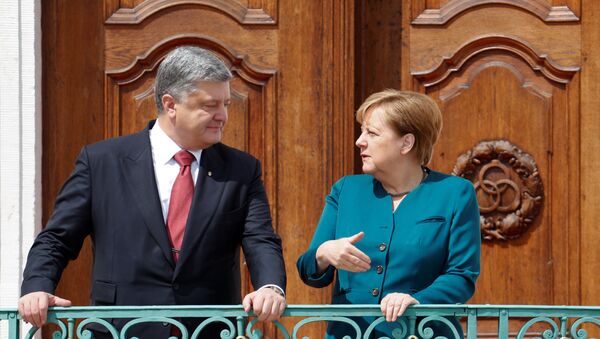 Председник Украјине Петро Порошенко и канцлерка Немачке Ангела Меркел - Sputnik Србија