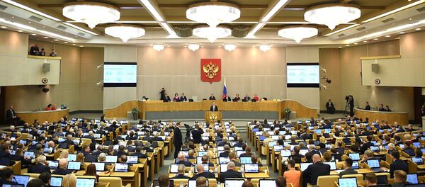 Руски премијер Дмитриј Медведев за говорницом у Државне думе Русије Руски премијер Дмитриј Медведев за говорницом у Државне думе Русије - Sputnik Србија