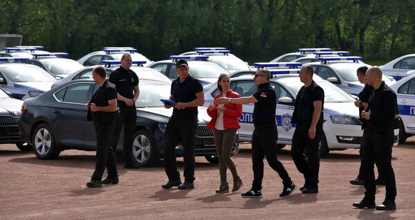 Pokazna vežba pripadnika Jedinice za obezbeđenje određenih ličnosti i objekata MUP-a (JZO) i instruktora Federalne službe obezbeđenja Ruske Federacije (FSO). - Sputnik Srbija