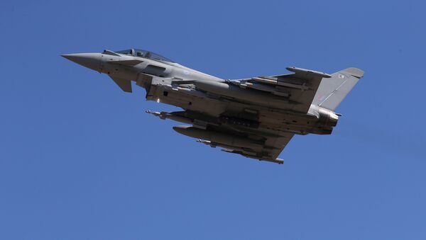 In this Thursday, Sept. 22, 2016, a Typhoon aircraft takes off from RAF, Akrotiri, Cyprus. British air forces for a mission in Iraq. British Tornado and Typhoon aircraft stationed at a U.K. air base in Cyprus are pounding Islamic State targets - Sputnik Србија