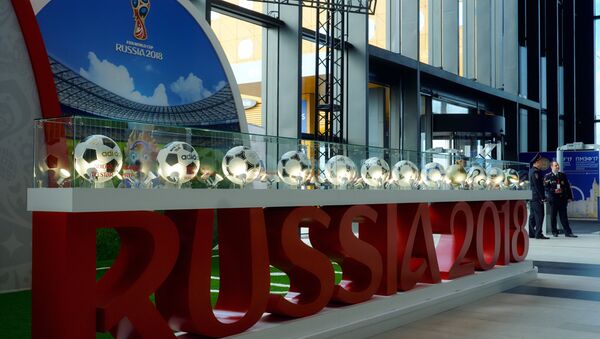 Штанд ФИФА светског првенства у фудбалу на Санкт Петербуршком економском форуму 2017. - Sputnik Србија