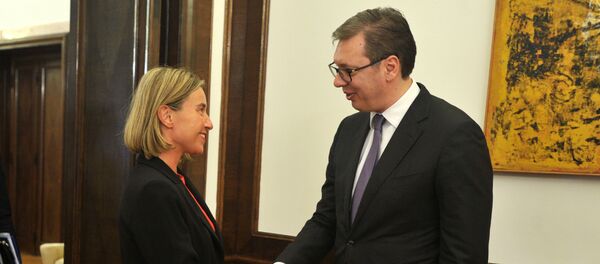 Председник Србије Александар Вучић са високом представницом ЕУ Федериком Могерини Председник Србије Александар Вучић са високом представницом ЕУ Федериком Могерини - Sputnik Србија
